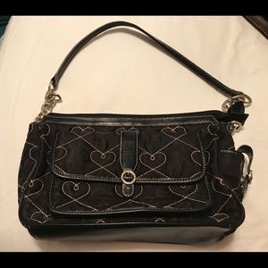Small black quilted Brighton heart handbag